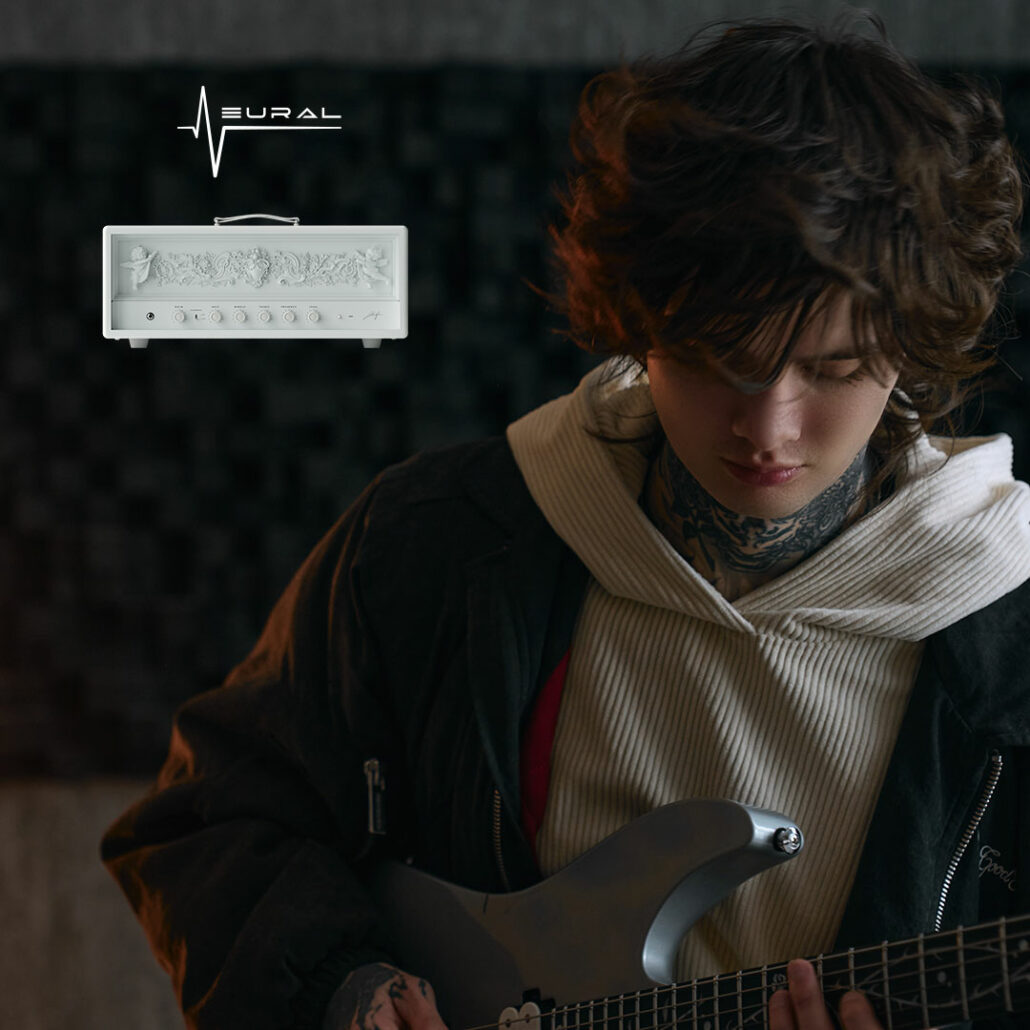 Tim Henson playing electric guitar